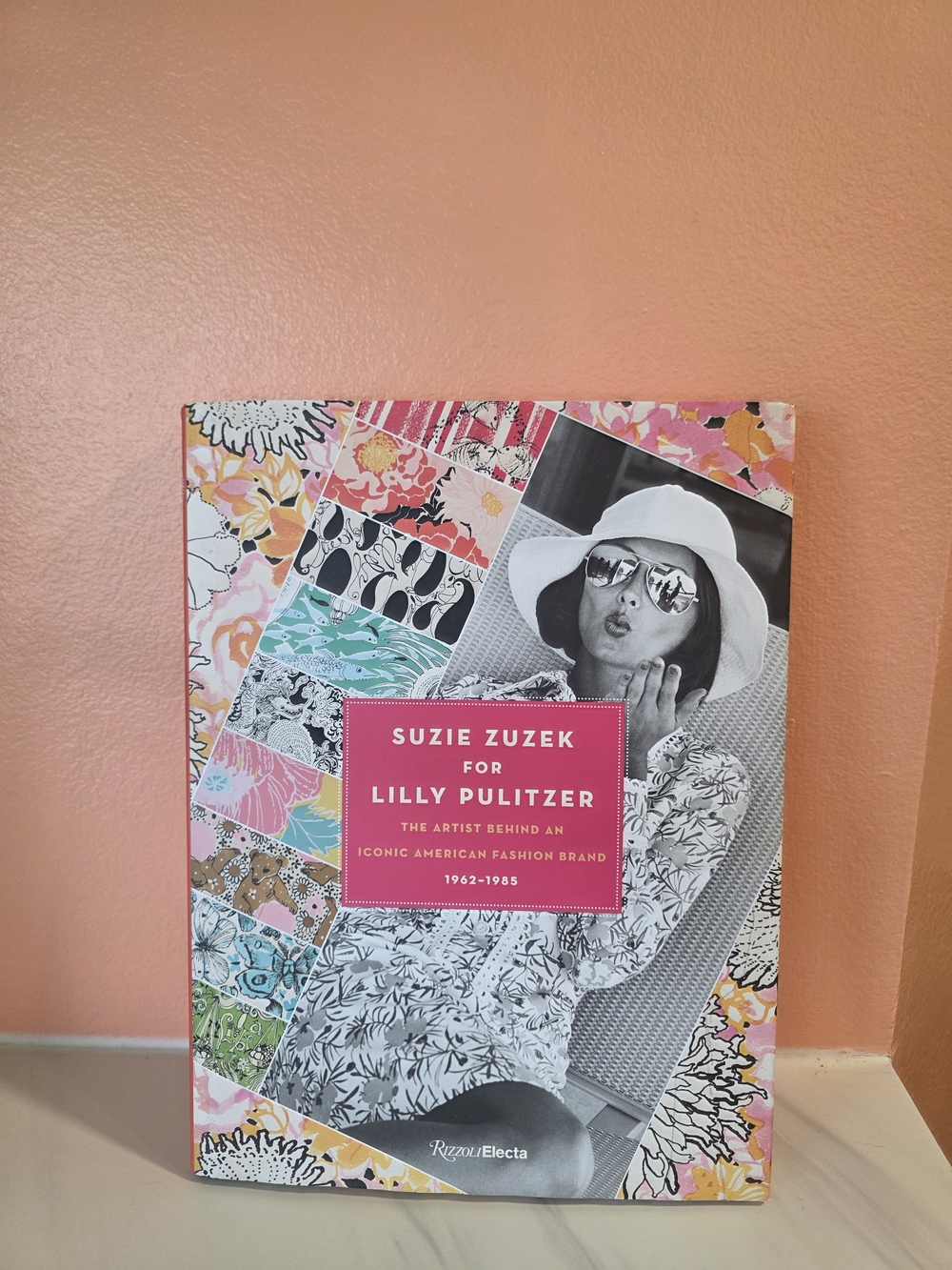 Colorful hardcover book "Suzie Zuzek for Lilly Pulitzer: The Artist Behind